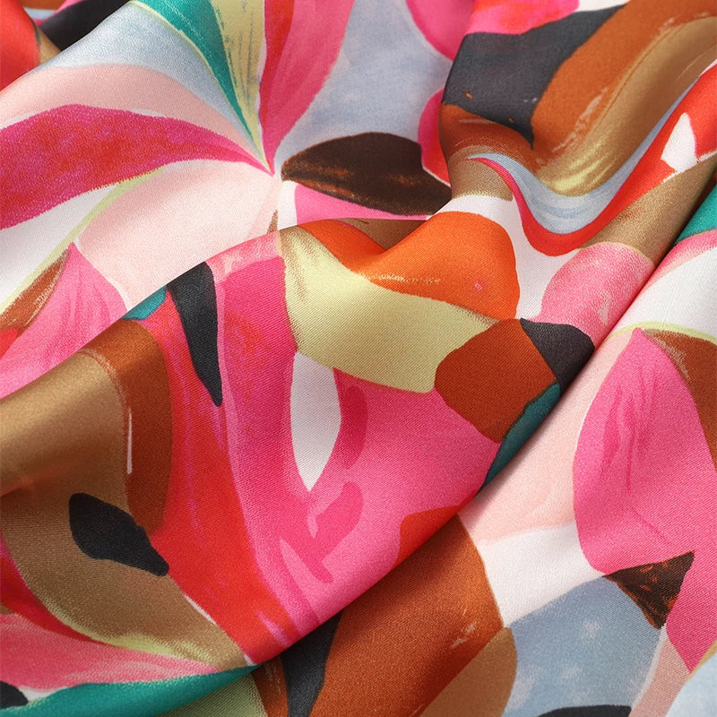 Pañuelo Versátil "Arte Vibrante": El Toque de Color Perfecto