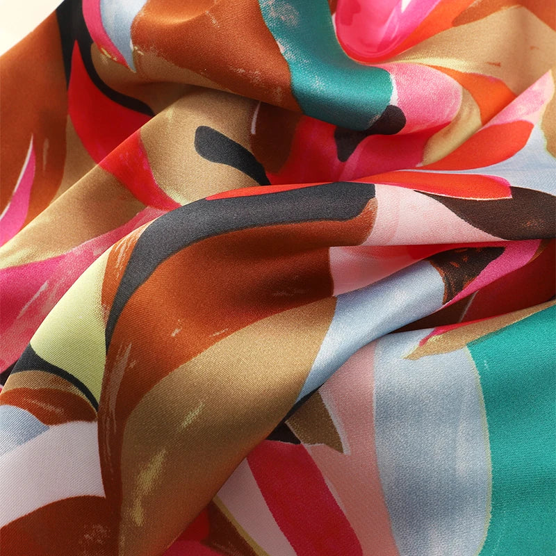 Pañuelo Versátil "Arte Vibrante": El Toque de Color Perfecto