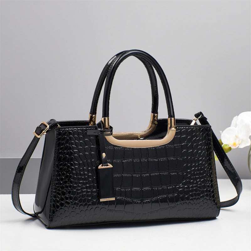 La Vendomia | Bolso tote clásico efecto cocodrilo con doble asa y detalles dorados.